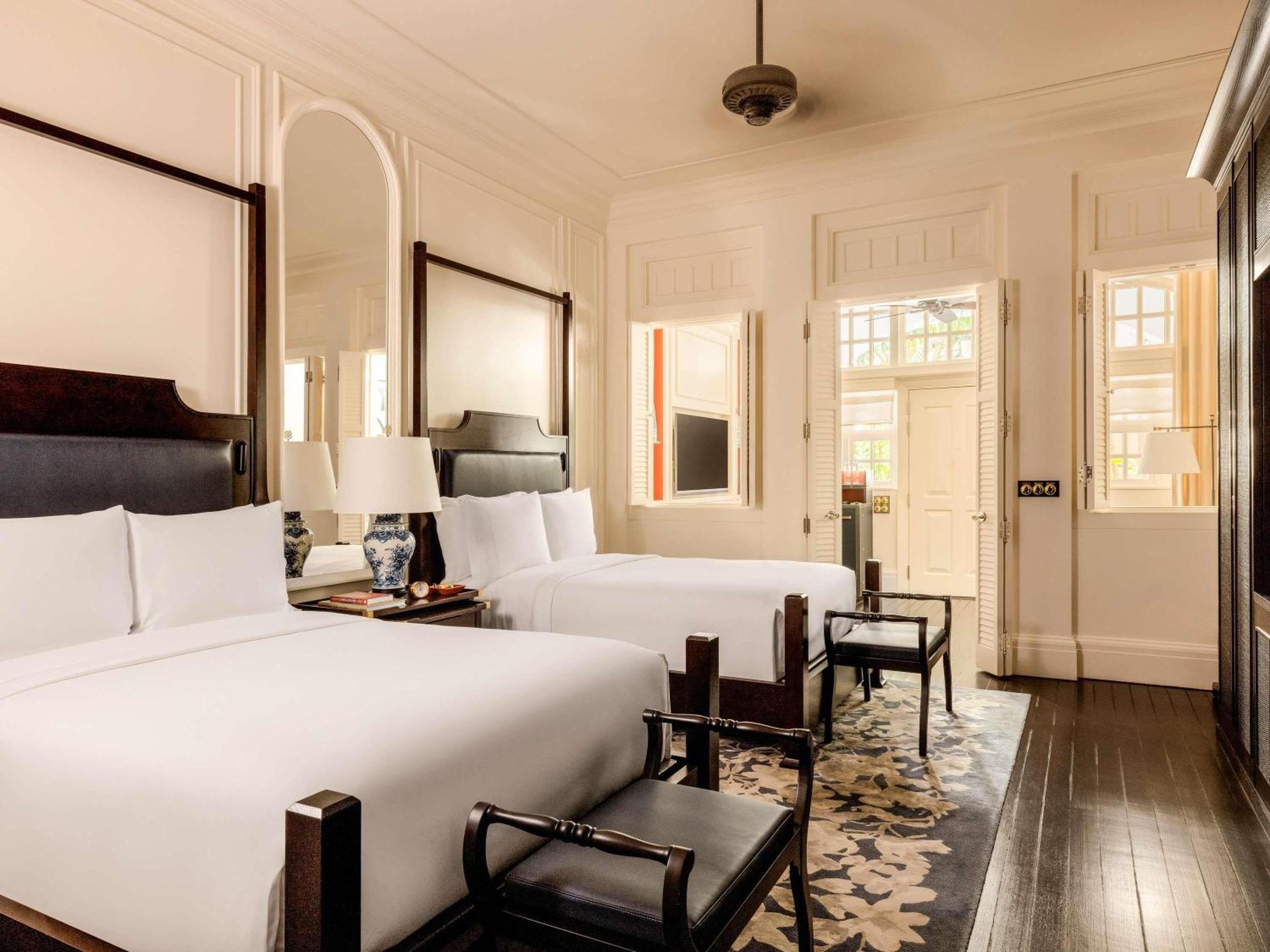 Suite Pati amb 2 Llits Dobles a Raffles Singapore